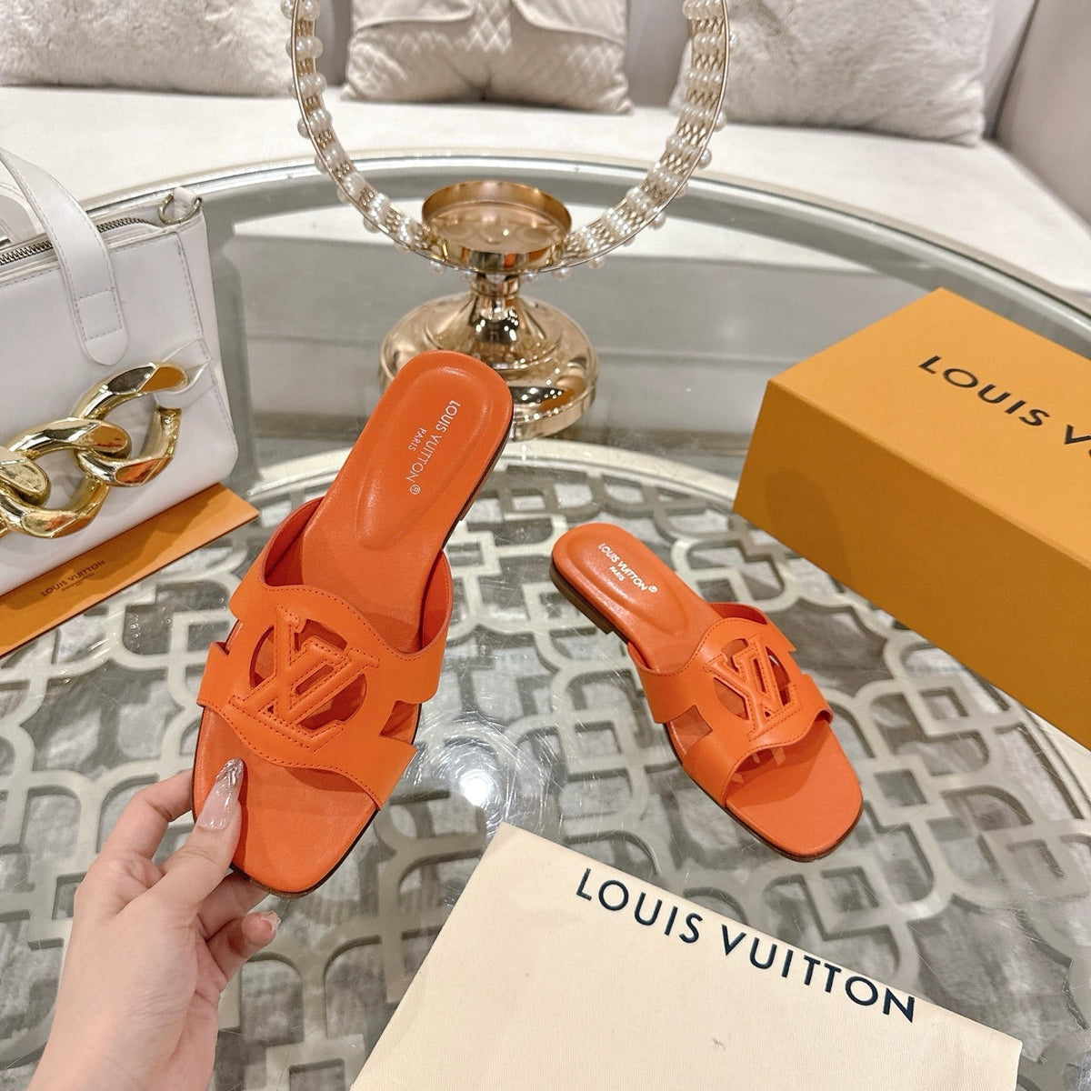 ISOLA FLAT SLIDE IN VIVID ORANGE CALFSKIN
