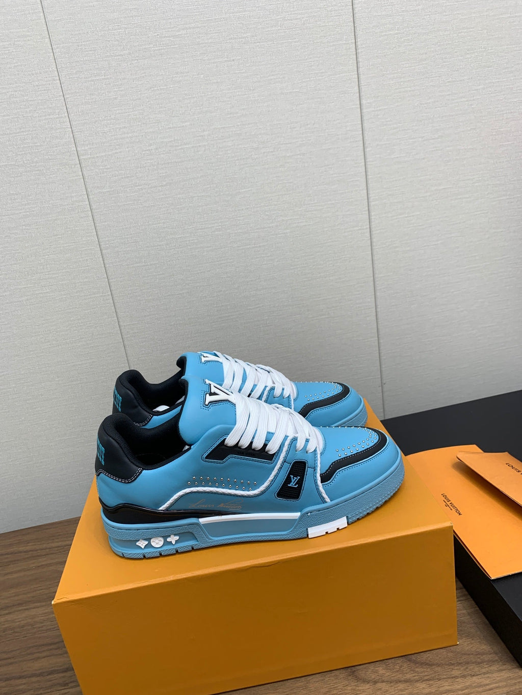 LV WOMEN'S TRAINER IN CERULEAN BLUE CALFSKIN